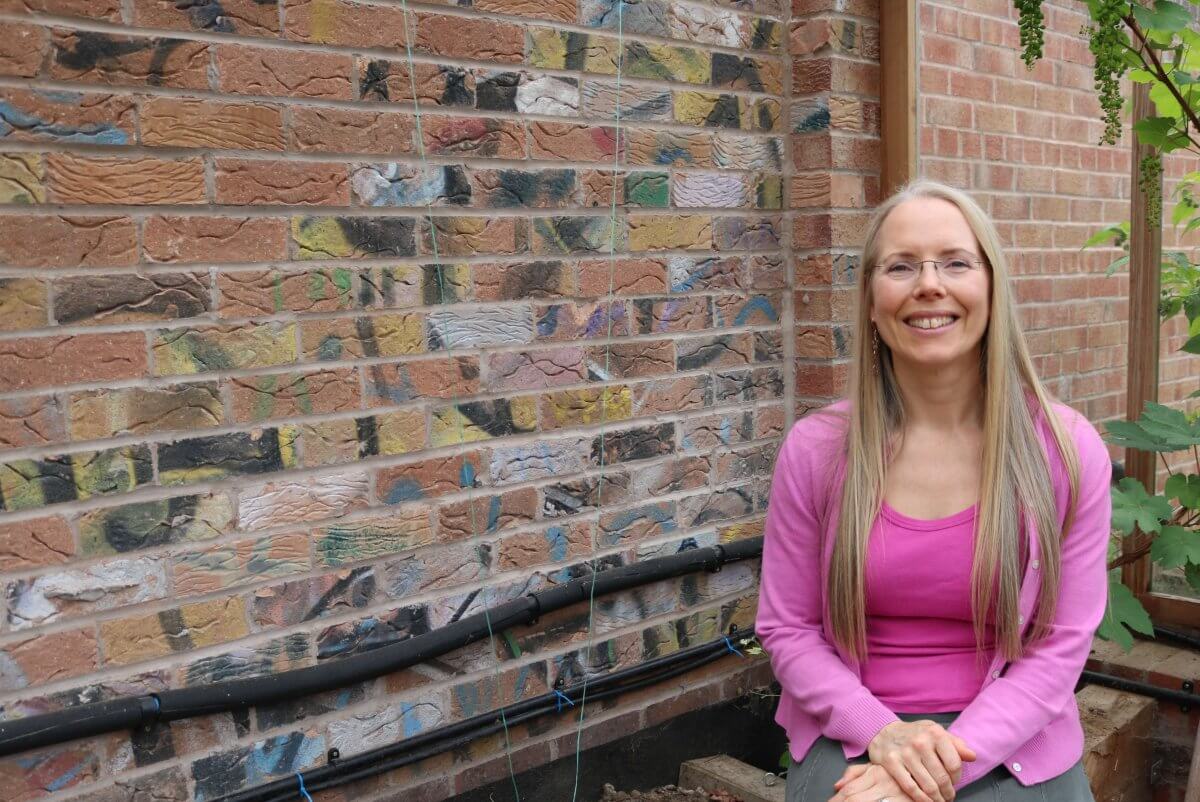 Ecology mortgage borrower with recycled bricks for sustainable self-build