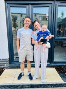 Tenants outside their new home in Croft's Court