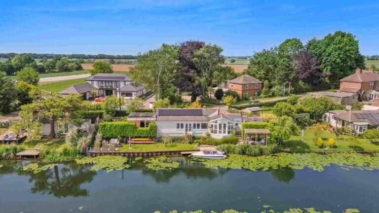 Looking over the Surfleet Reservoir at Number 23, an award-winning retrofit renovation made possible through an Ecology Renovation Mortgage