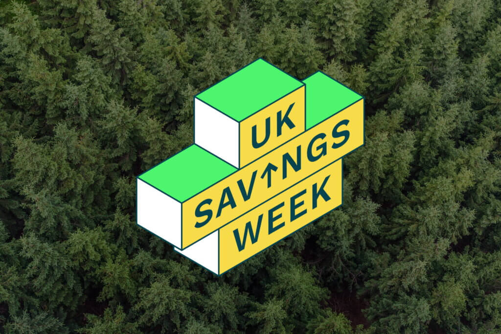 UK Savings Week Yellow & Green Logo on Background of Evergreen Trees