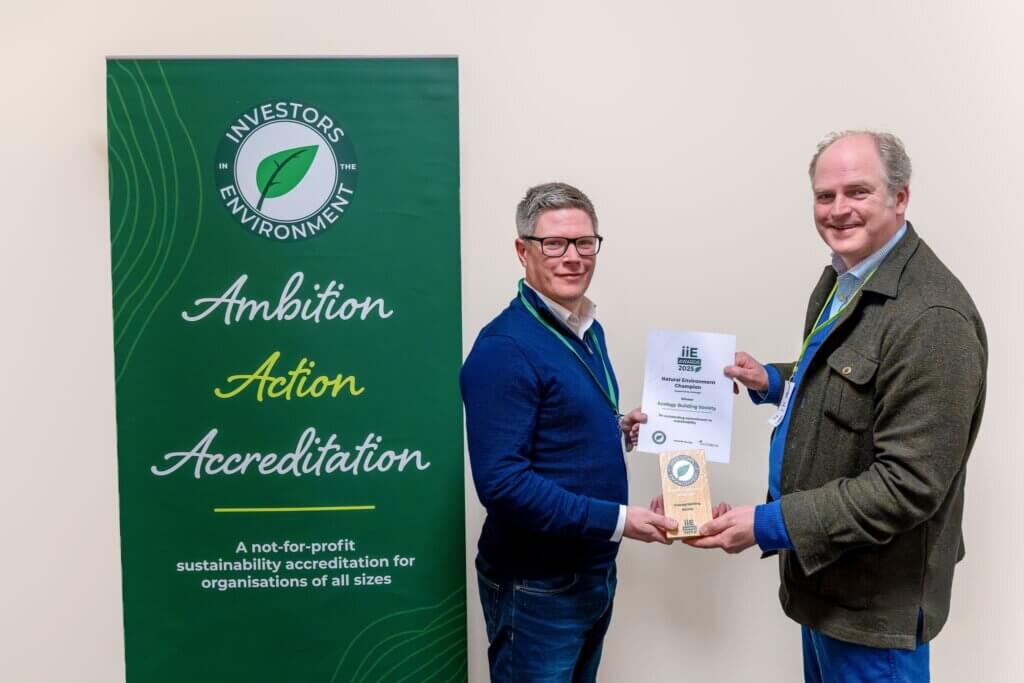 Mark Elliott collecting Ecology's Investors in the Environment Award