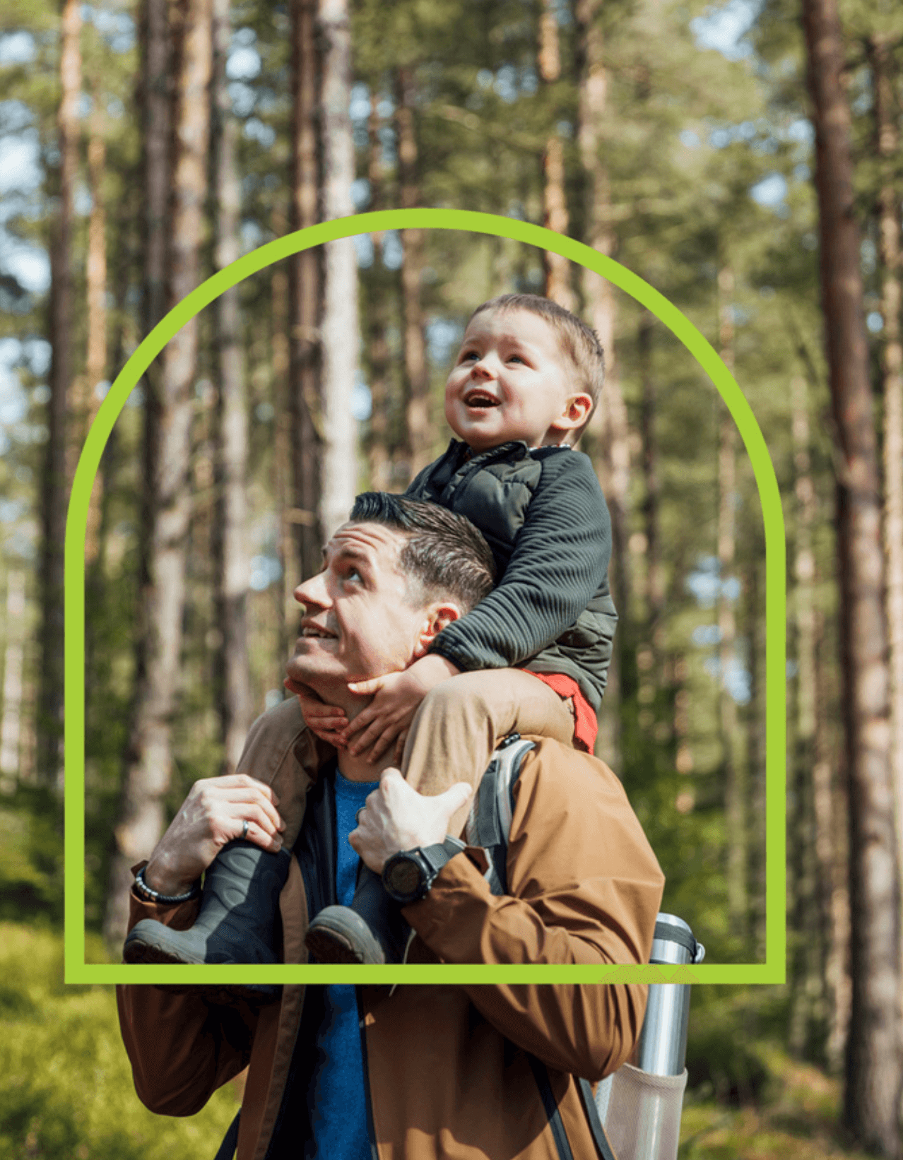 Father with his toddler son on his shoulders in a forest both looking upwards smiling. A lime green graphic arch is placed over the image farming the pair